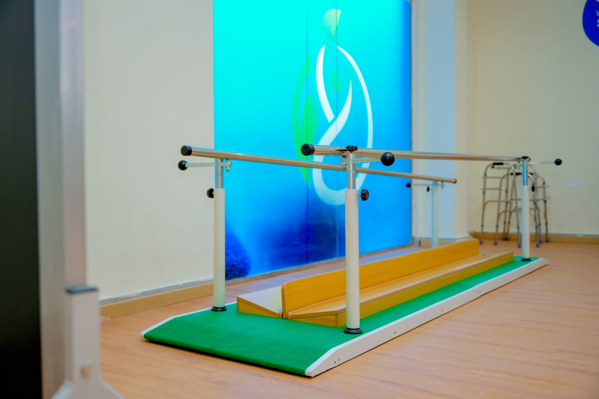 Parallel bars prepared for supported walking practice at Rayhan Centre