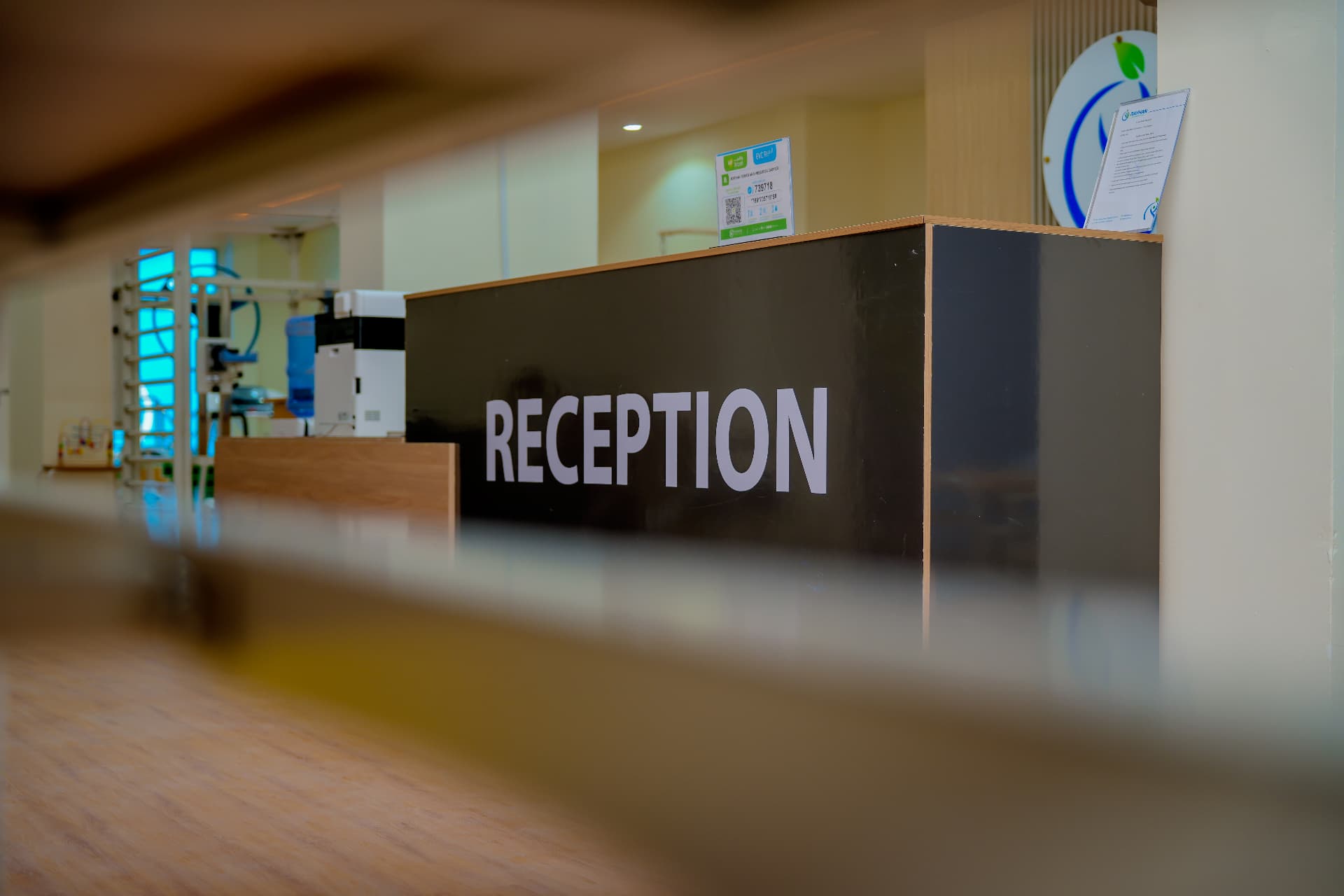 Reception desk welcoming visitors to Rayhan Centre